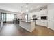 Modern kitchen featuring granite countertops, stainless steel appliances, and a spacious island at 2646 Neighborhood S Walk, Villa Rica, GA 30180