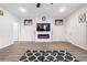 Open floor plan living room with fireplace and a view of the front entrance and other rooms at 2646 Neighborhood S Walk, Villa Rica, GA 30180