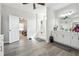 Bright bathroom featuring double sinks, modern fixtures, and an open shower space at 2646 Neighborhood S Walk, Villa Rica, GA 30180