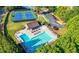 Aerial view of community pool and tennis courts; beautiful amenity for residents at 3330 Arborwoods Dr, Alpharetta, GA 30022
