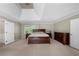 Spacious bedroom featuring a large bed, neutral walls, and ample natural light through the window at 3330 Arborwoods Dr, Alpharetta, GA 30022