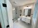 Bathroom featuring tiled floors, shower, toilet, vanity, and black hardware at 3820 Fox Creek Ct, Marietta, GA 30062