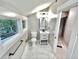 Bright bathroom showcasing modern fixtures and a large window with natural light at 3820 Fox Creek Ct, Marietta, GA 30062
