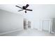 Neutral-colored bedroom with ceiling fan and white-painted doors and trim at 3820 Fox Creek Ct, Marietta, GA 30062