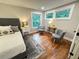 Comfortable bedroom features a cozy bed, modern decor, and natural light at 3820 Fox Creek Ct, Marietta, GA 30062