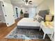 Serene bedroom featuring a comfortable bed, hardwood floors, and ample natural light at 3820 Fox Creek Ct, Marietta, GA 30062