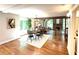 Charming dining room with hardwood floors, views to the living room, and natural lighting at 3820 Fox Creek Ct, Marietta, GA 30062