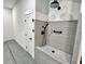 Unique dog washing station with gray subway tile, handheld shower, and non-slip floor at 3820 Fox Creek Ct, Marietta, GA 30062