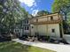 Back exterior view of the home featuring a wooden deck and outdoor space at 3820 Fox Creek Ct, Marietta, GA 30062