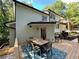 Wooden deck with outdoor dining set, perfect for entertaining, adjoins home at 3820 Fox Creek Ct, Marietta, GA 30062