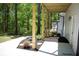 Home's outdoor living space with patio, landscaping, and backyard view at 3820 Fox Creek Ct, Marietta, GA 30062