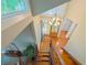 Elegant foyer with wooden staircase and a chandelier hanging from the second story at 3820 Fox Creek Ct, Marietta, GA 30062