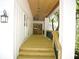 Welcoming front porch with tongue and groove ceiling and wood railing at 3820 Fox Creek Ct, Marietta, GA 30062