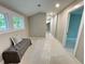 A neutral colored hallway includes a cushioned bench seat beneath two windows at 3820 Fox Creek Ct, Marietta, GA 30062
