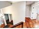Hallway with hardwood floors and views of the staircase at 3820 Fox Creek Ct, Marietta, GA 30062