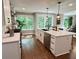 Bright kitchen with large windows, a stainless steel dishwasher, and a white center island at 3820 Fox Creek Ct, Marietta, GA 30062