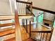 Open concept living room with stone fireplace, hardwood floors, and large windows at 3820 Fox Creek Ct, Marietta, GA 30062