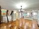 Open-concept living room and kitchen with hardwood floors and modern finishes at 3820 Fox Creek Ct, Marietta, GA 30062