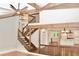 Open living space with vaulted ceilings, wood beams, and staircase at 3820 Fox Creek Ct, Marietta, GA 30062