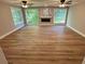 Spacious living room with modern fireplace and large windows offering peaceful outdoor views at 3820 Fox Creek Ct, Marietta, GA 30062