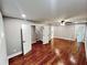 Living room with hardwood floors and multiple entryways at 3820 Fox Creek Ct, Marietta, GA 30062