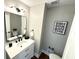 Stylish powder room features sleek fixtures, modern lighting, and contemporary decor at 3820 Fox Creek Ct, Marietta, GA 30062