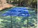 Brightly colored tennis courts surrounded by tall fences, perfect for community recreation at 3820 Fox Creek Ct, Marietta, GA 30062