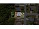 Aerial view showing the house's layout and landscaping at 5655 Hedge Brook Dr, Cumming, GA 30028
