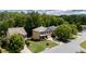Well-maintained two-story home with manicured lawn, mature trees, and charming curb appeal in a friendly neighborhood at 5655 Hedge Brook Dr, Cumming, GA 30028