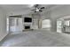 Spacious living room with vaulted ceiling, built-in shelving, and fireplace at 179 Carter Rd, Auburn, GA 30011