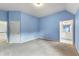 Spacious blue bedroom with an ensuite bathroom and walk in closet at 2310 Norbury Se Cv, Smyrna, GA 30080