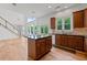 Bright kitchen with center island, wood floors, and access to the backyard at 2310 Norbury Se Cv, Smyrna, GA 30080