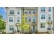 Townhome featuring painted brick and visible address number at 3313 Bartee Walk, Suwanee, GA 30024