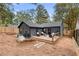 Spacious backyard featuring a well-maintained deck with outdoor seating and a fenced perimeter at 410 Wilkinson Se Dr, Atlanta, GA 30317