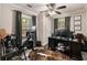 Bedroom with a desk, fan and windows at 410 Wilkinson Se Dr, Atlanta, GA 30317