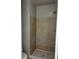 Bathroom featuring a tiled shower and neutral color scheme at 458 Prince Of Wales, Stone Mountain, GA 30083