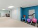 Finished basement with neutral carpet and recessed lighting, perfect for recreation and relaxation at 8117 Spivey Rd, Jonesboro, GA 30236