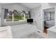 Bathroom features a soaking tub with views and natural light at 8117 Spivey Rd, Jonesboro, GA 30236