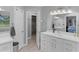 Bathroom featuring a double vanity, open shower, and neutral tones at 8117 Spivey Rd, Jonesboro, GA 30236