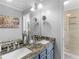Bathroom features double sinks, granite counters and walk-in shower at 8117 Spivey Rd, Jonesboro, GA 30236
