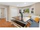 Charming breakfast nook with custom bench seating, bright windows, and a spacious table at 8117 Spivey Rd, Jonesboro, GA 30236