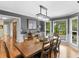 Elegant dining room with a decorative chandelier and a large wooden dining table at 8117 Spivey Rd, Jonesboro, GA 30236