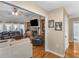 Living room featuring a fireplace, hardwood floors, and comfortable seating at 8117 Spivey Rd, Jonesboro, GA 30236
