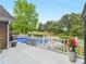 Beautiful pool area with a white fence and green lawn, perfect for outdoor relaxation at 8117 Spivey Rd, Jonesboro, GA 30236