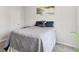 Cozy bedroom showcasing a double bed with soft furnishings and an ambient and comforting atmosphere at 109 Logan Pass Dr, Loganville, GA 30052