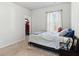 Comfortable bedroom with carpet, window, and closet at 109 Logan Pass Dr, Loganville, GA 30052