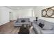 Bright upstairs living room featuring hardwood floors and neutral paint at 109 Logan Pass Dr, Loganville, GA 30052