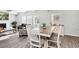 Inviting living space featuring a dining area adjacent to the living room, promoting togetherness at 109 Logan Pass Dr, Loganville, GA 30052