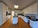 Spacious kitchen featuring modern appliances, ample cabinetry, and a functional center island at 1301 Winesap Se Ct, Conyers, GA 30013