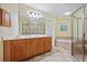 The primary bath features a double vanity, walk-in shower and separate jacuzzi tub at 1605 Pavillion Ridge Se Dr, Smyrna, GA 30080